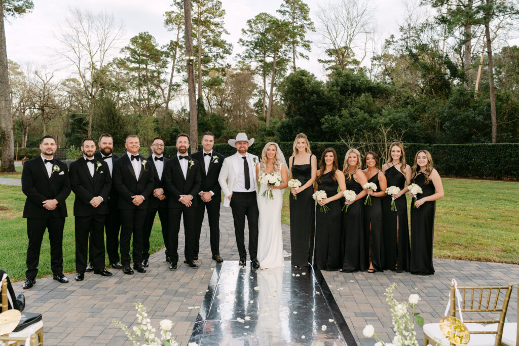 Part of the wedding party for Claudine and Austin Simmon's wedding New Year's Day in The Woodlands. (Photo by Weddings by Trey)