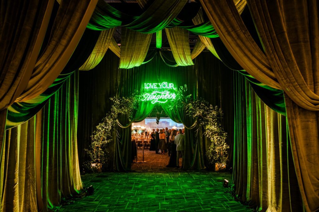 Floral arrangements and soft lighting welcome guests to the Interfaith Love Thy Neighbor gala at The Woodlands Waterway Marriott. (Photo by Interfaith of The Woodlands)