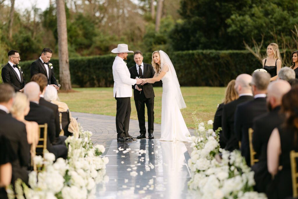 A backyard wedding ceremony on New Year's Day for Austin and Claudine Simmons and their children was held New Year's Day. (Photo by Weddings by Trey)