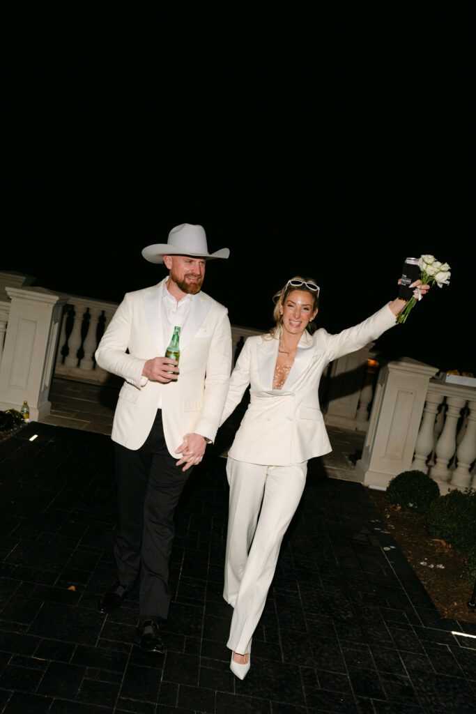 The happy couple at the end of the reception. (Photo by Weddings by Trey)