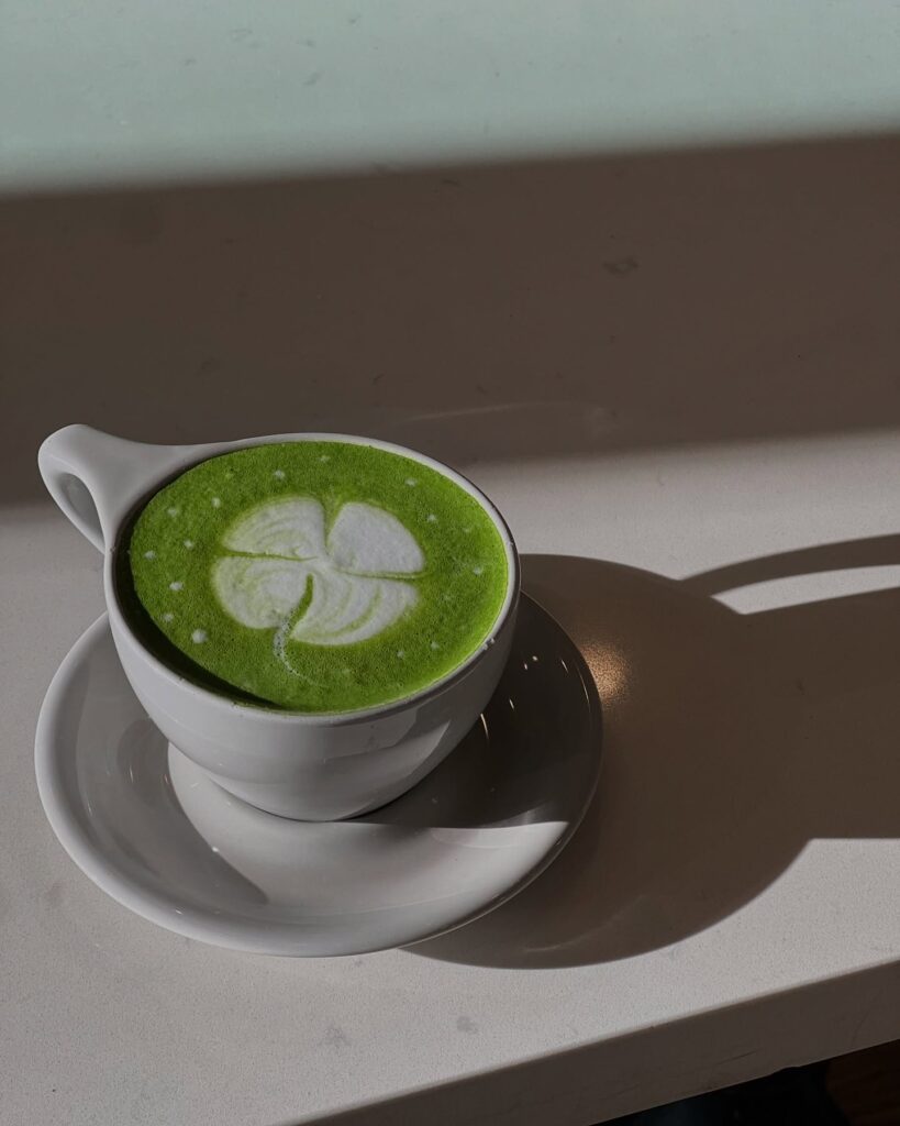 Blue Door Coffee serves a smooth matcha latte with a vibrant green hue. (Photo courtesy of Blue Door Coffee)