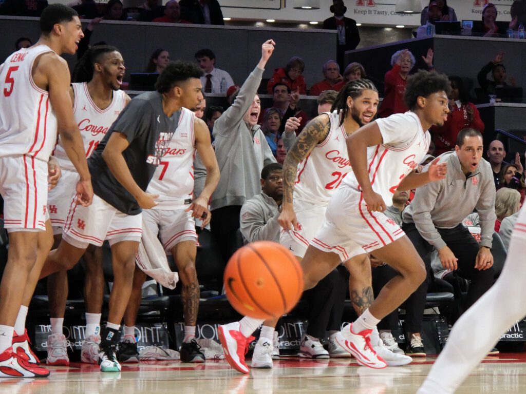 University of Houston's players enjoy each other's success and celebrate them — no matter who's on the court or the bench. (Photo by F. Carter Smith)