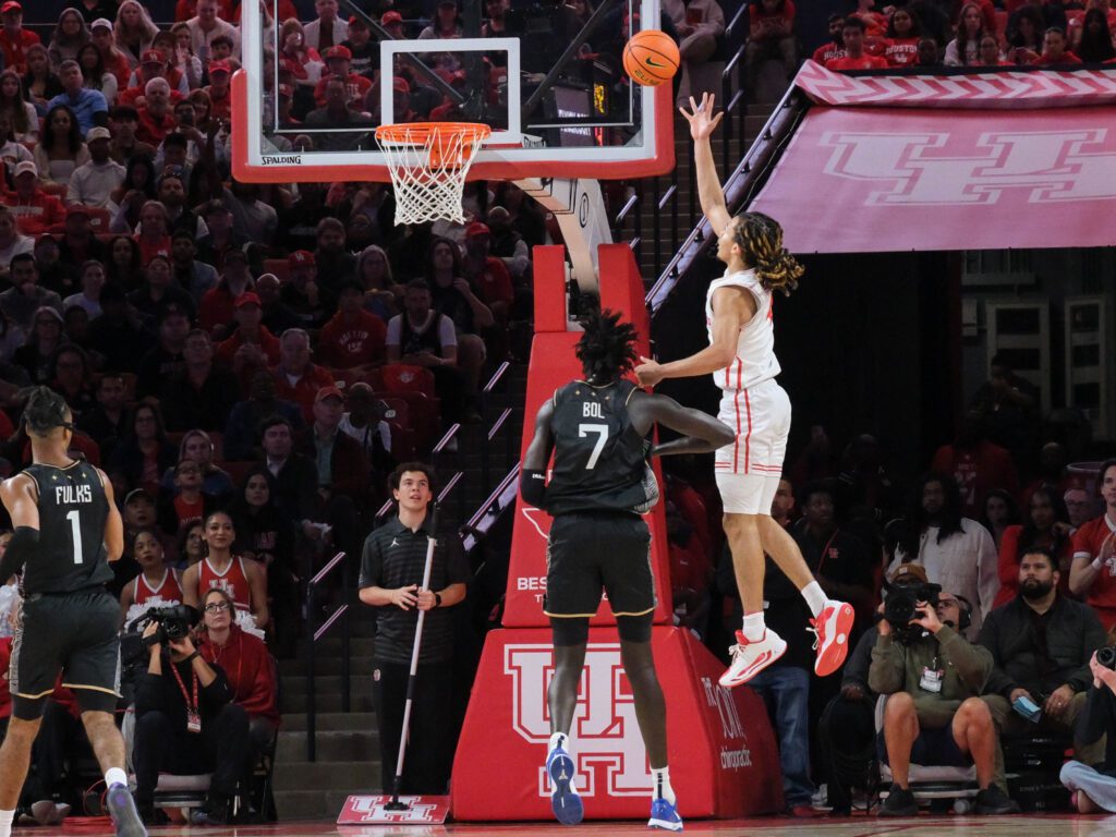 University of Houston point guard Kingston Flemings finds a way to get inside again and again. (Photo by F. Carter Smith)