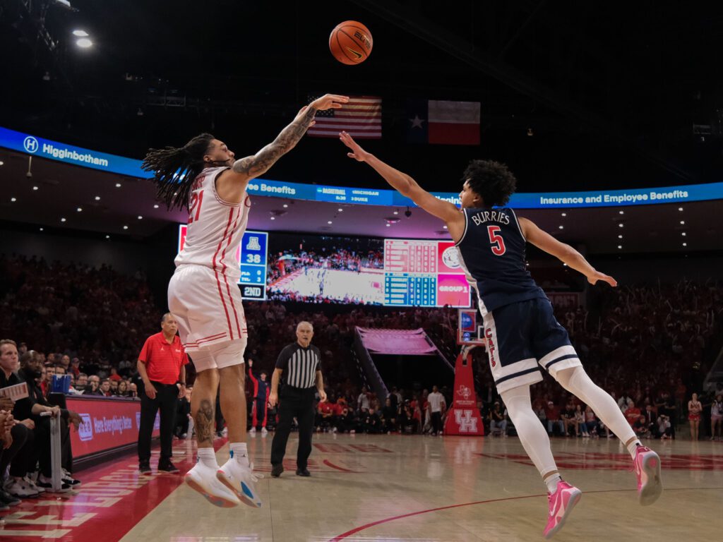 University of Houston guard Emanuel Sharp is hounded everywhere he goes. But if UH can run more, he'll get more open threes. (Photo by F. Carter Smith)