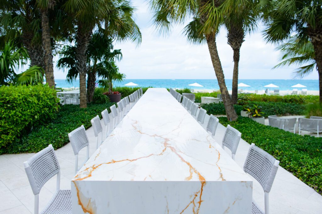 Infiniti Sushi Bar stretches across Grace Bay Club to the beach, making the 90-foot bar the longest bar in the Caribbean. (Photo by Grace Bay Club)