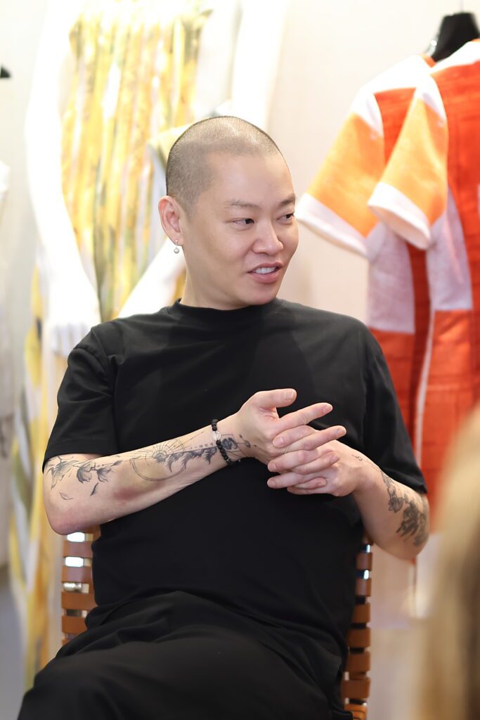 Jason Wu at the Elizabeth Anthony tea and fashion presentation with Jason Wu