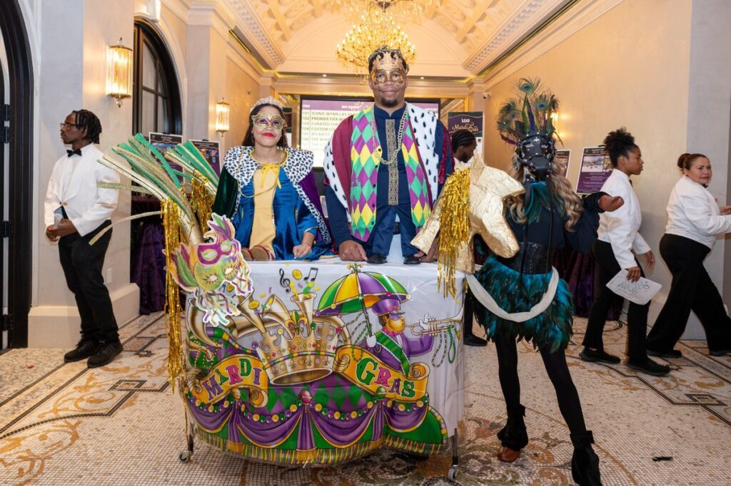 Party floats and entertainers set the stage for LEAD's Mardi Gras Charity Event  held at  Le Tesserae in EaDo