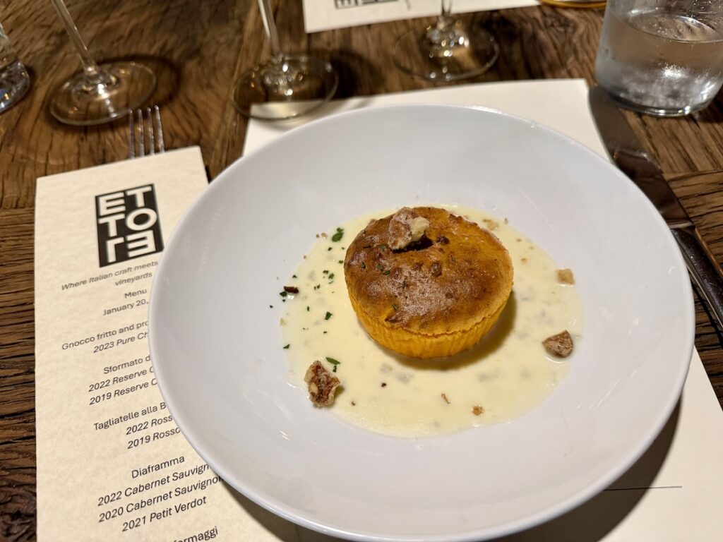 A carrot sformata served over a gorgonzola sauce made the Ettore Reserve Chardonnay sing. (Please the Palate)