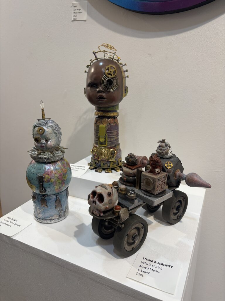 Artist Valerie Gudell created three-dimensional mixed media works. (Photo by Laura Landsbaum)