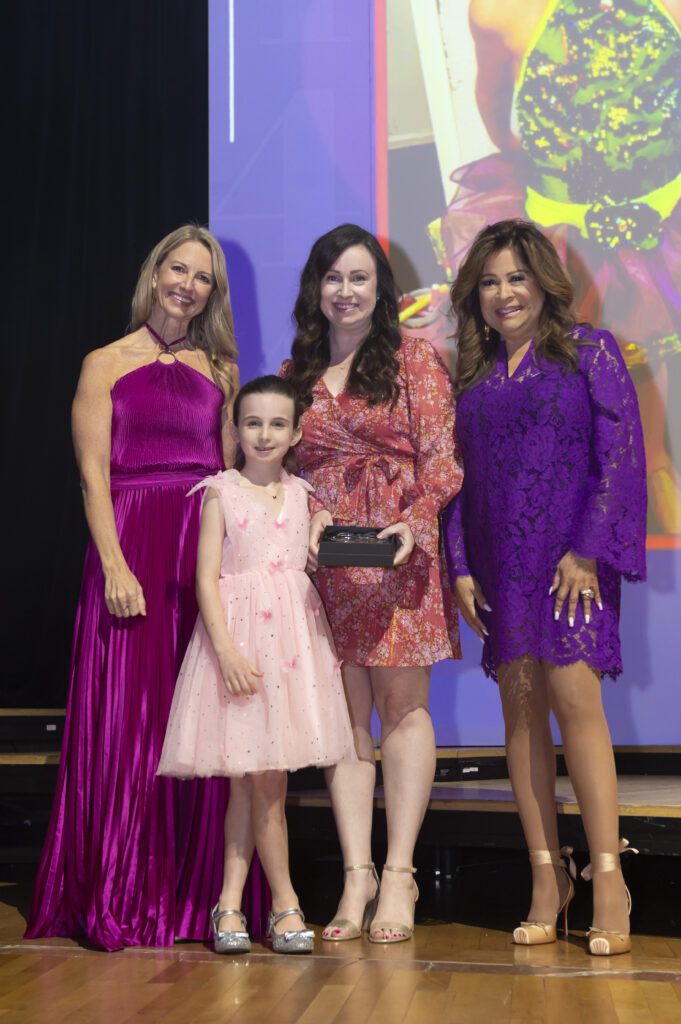 Leah Swanson, Spirit of Tom Landry Award recipient Vivian Haddad, Lara Haddad, emcee Clarice Tinsley (Photo by Tamytha Cameron and Celeste Cass)