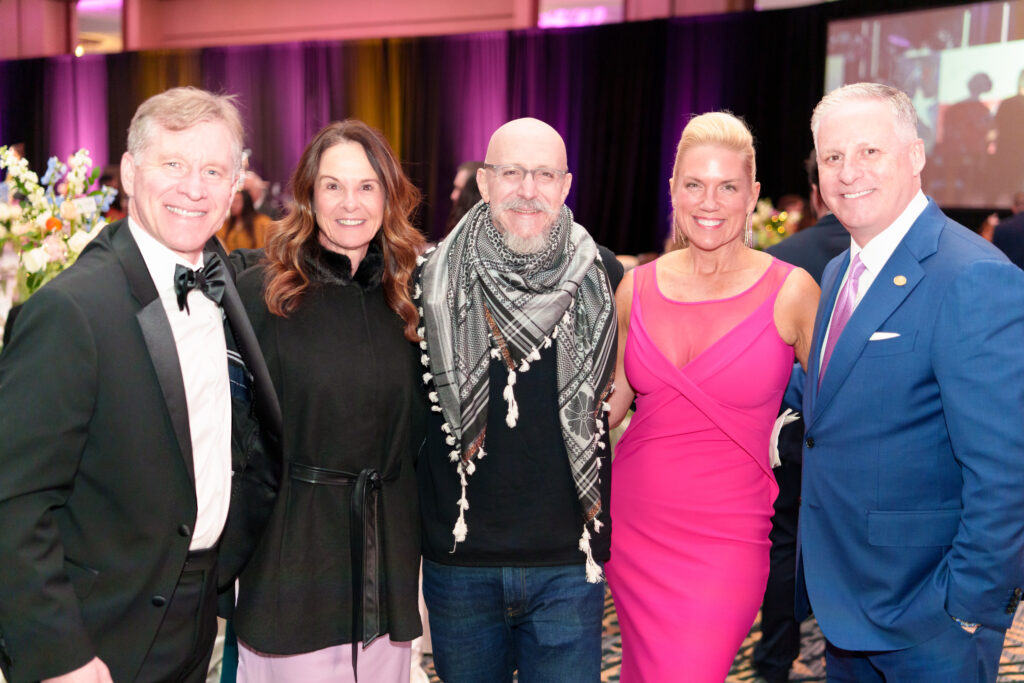 Friends joined Township Board President Brad Bailey and Kim Bailey, shown at far right, during the Invincible Summer gala at The Woodlands Resort.