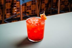 The Frozen Mangonada, blended with aged and Mexican rums, mango, lime, chamoy and chile spices