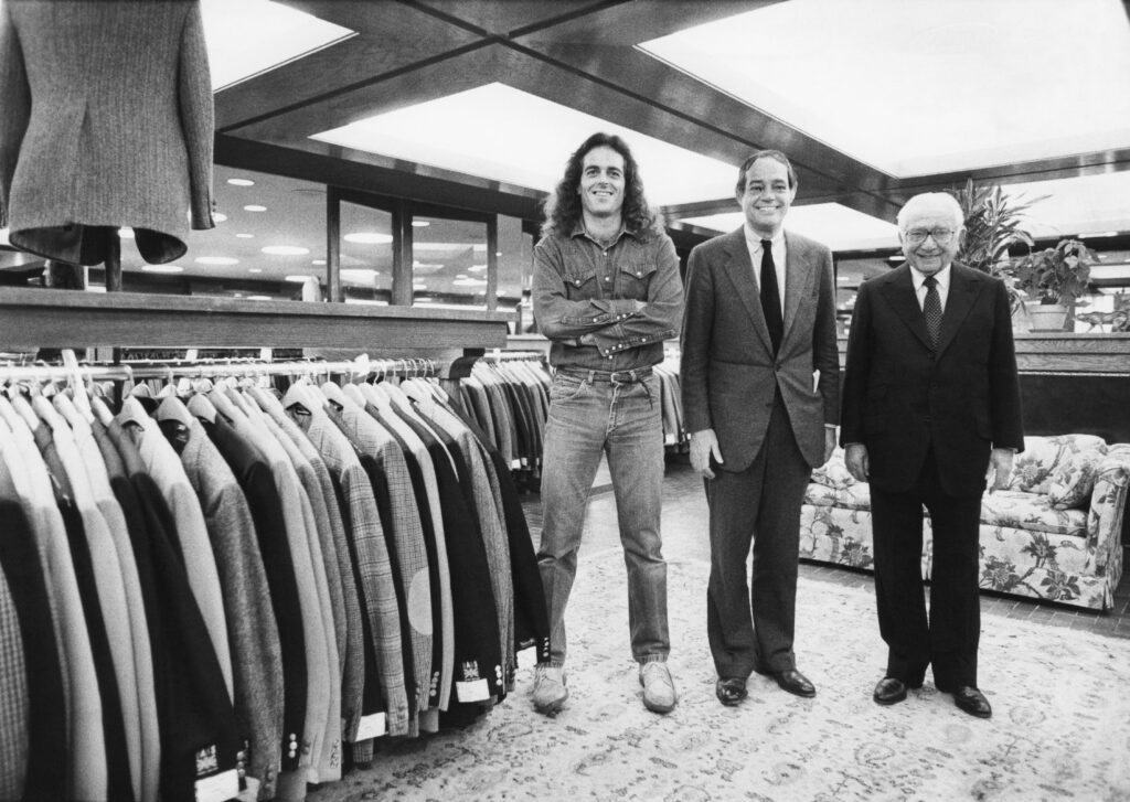 Barney Pressman, the founder of Barneys, with his son Fred and grandson Gene in the clothing store at Seventh Avenue and 17th Street in Manhattan, November 28, 1979 (Jack Manning/The New York Times)