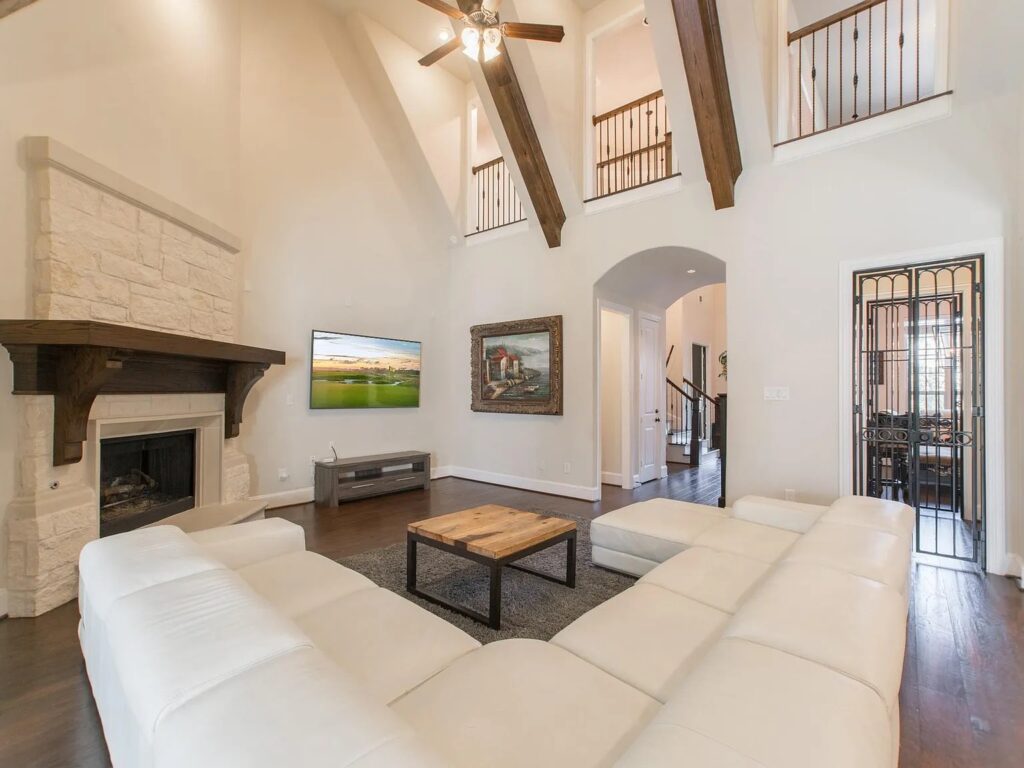 The family room at 19 Brittany Rose Place is inviting and warm.
