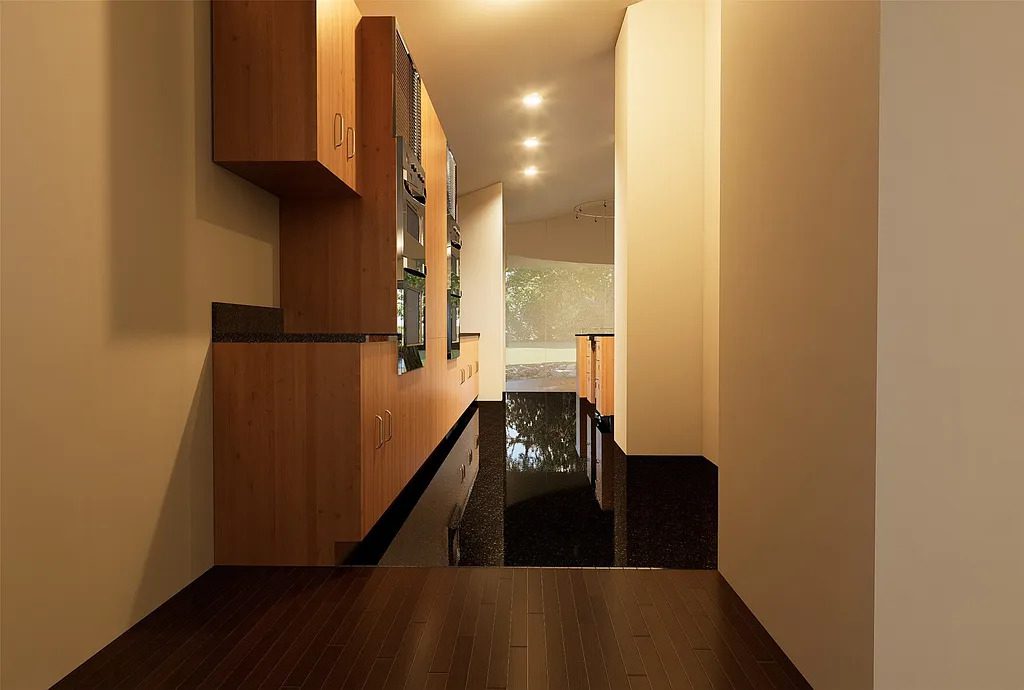 A long interior corridor at 4301 Briarhaven Road features sleek wood cabinetry, built-in appliances, and glossy dark flooring that reflects natural light from the windows beyond. (Courtesy)