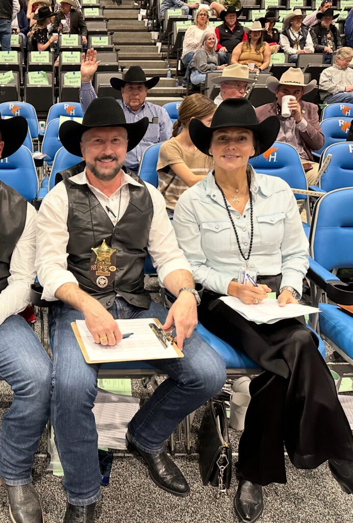 RodeoHouston Steer Committee members and founders of Rodeo Auction Angels Tony Bradfield and Dana Barton, pictured here at the 2025 auction, are back in the saddle for this year's Junior Market Steer Auction. 