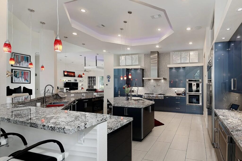 This modern kitchen is contemporary and extravagant. 