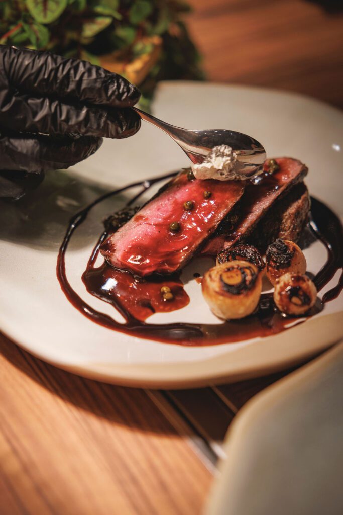 The fourth course potentially stole the show as a Whiskey-Brined 45-Day Dry-Aged Tomahawk paired with the JW Marriott Single Barrel from Garrison Brothers.