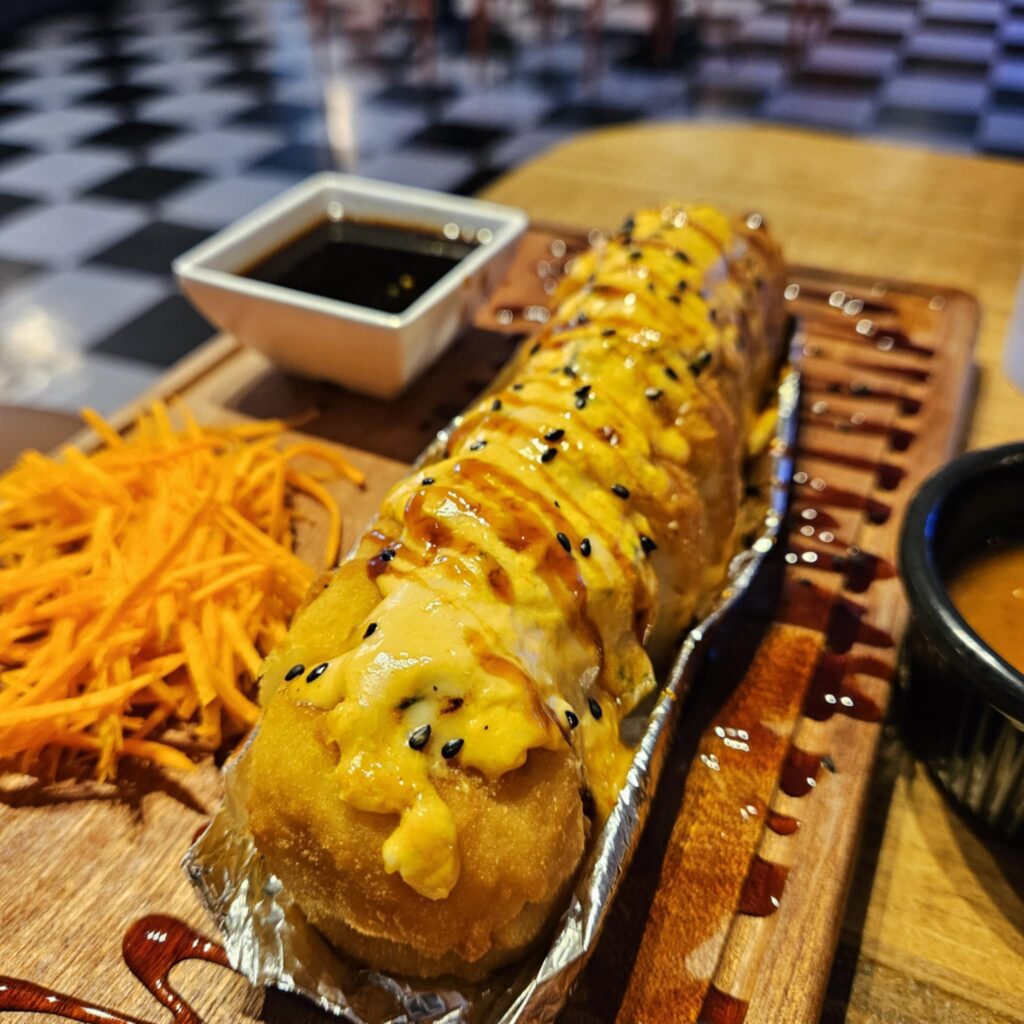 The Demon Roll at Marisqueando Ando, filled with beef and shrimp, is a standout. (Courtesy)