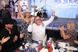 Brittany Franklin and Strider Noone, Senior Sales Manager with JD Fields & Company wins Villa in Cabo donated by Matt Hubbard for $175,000 on behalf of JD Fields & Company_Quy Tran Photography