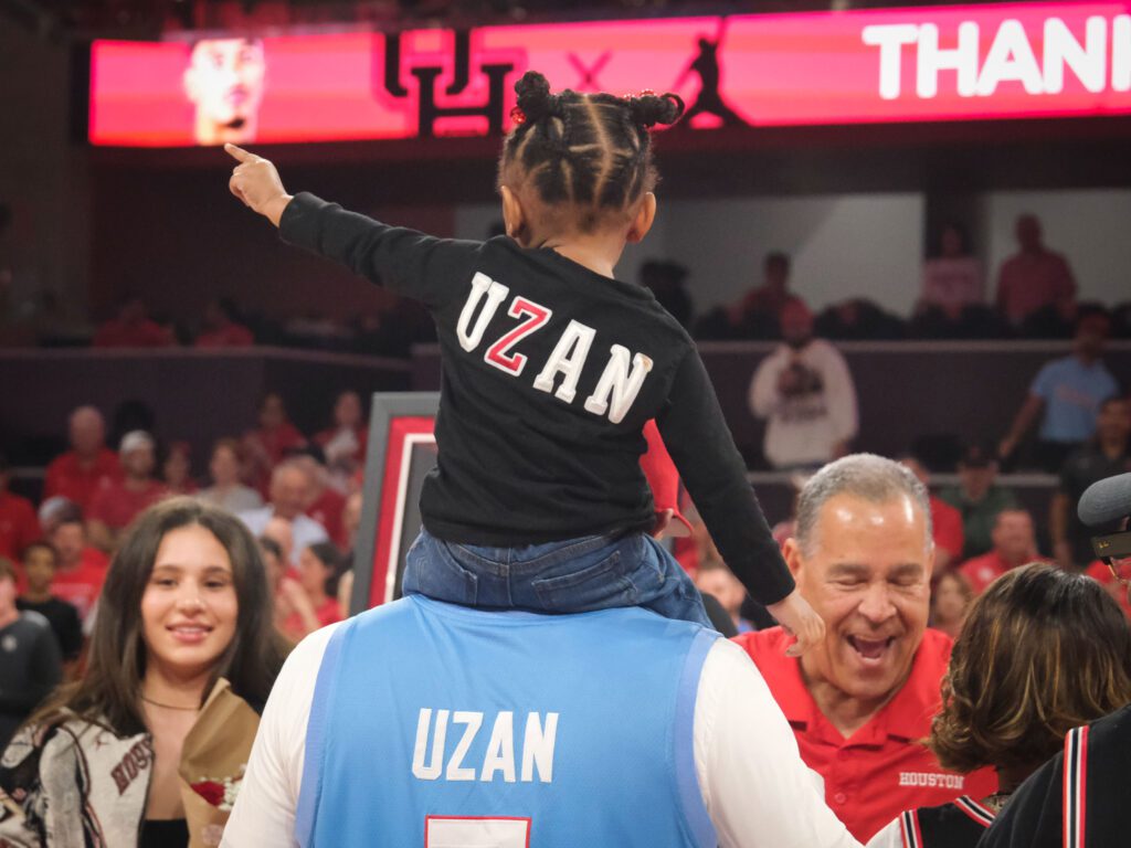 University of Houston senior point guard Milos Uzan gets a lot of support. (Photo by F. Carter Smith)