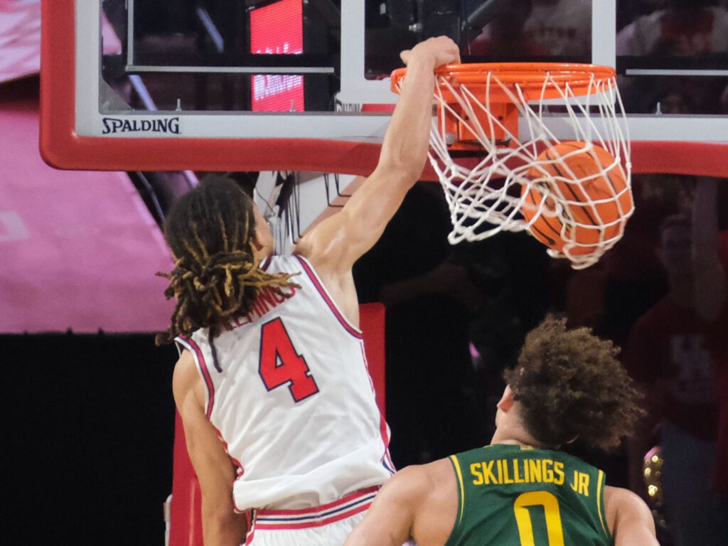 University of Houston point guard Kingston Flemings is hard to keep from the rim. (Photo by F. Carter Smith)