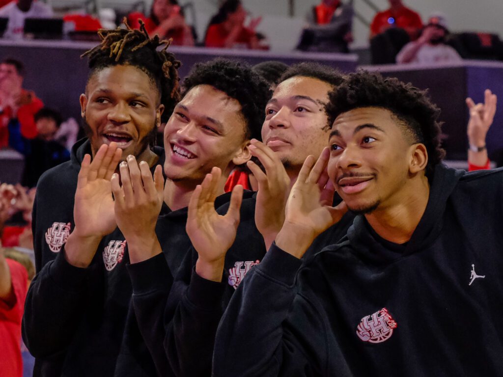 University of Houston players JoJo Tugler, Isiah Harwell, Kingston Flemings and Chase McCarty are excited to see UH with a No. 2 seed. (Photo by F. Carter Smith)