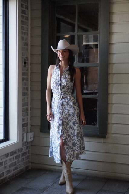 A simple summer dress paired with boots and a hat instantly becomes a chic Western ensemble. (Photo courtesy Pell 1990)
