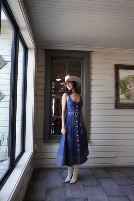 Madelyn Payne of Page Parkes models western wear at Wuensche Bros. in Old Town Spring. (Photo courtesy  Pell 1990)