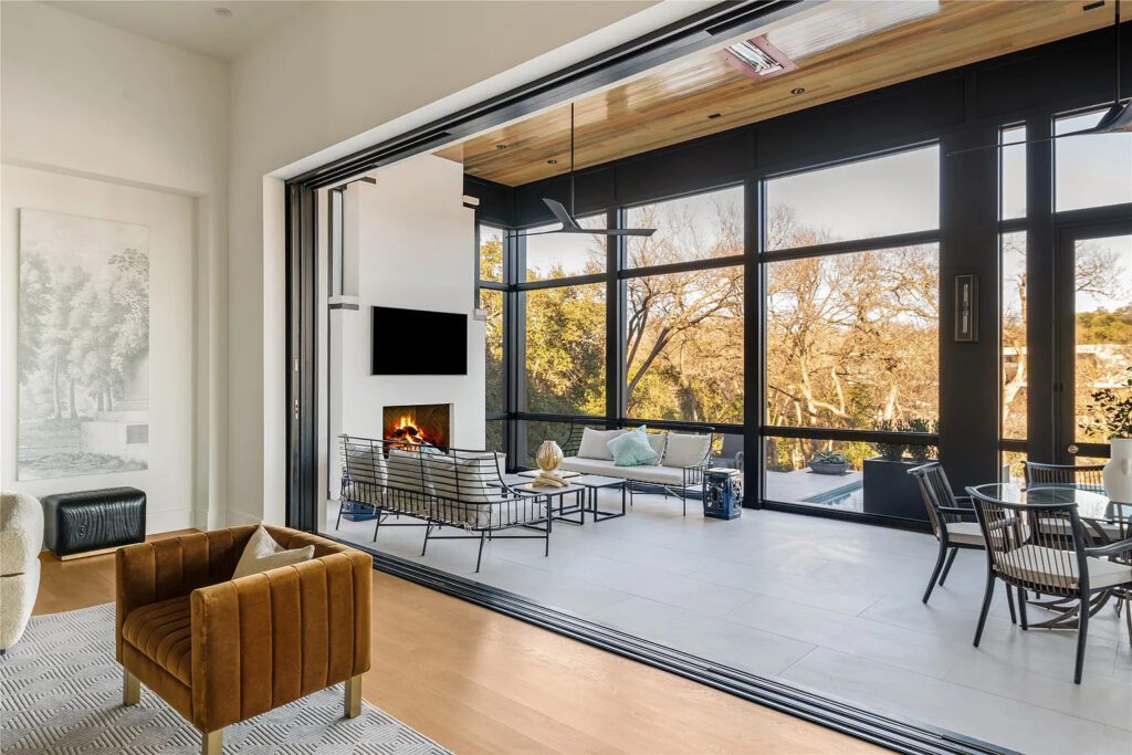 The property ideally combines indoor and outdoor living spaces. (Photo by Allie Beth Allman & Associates)