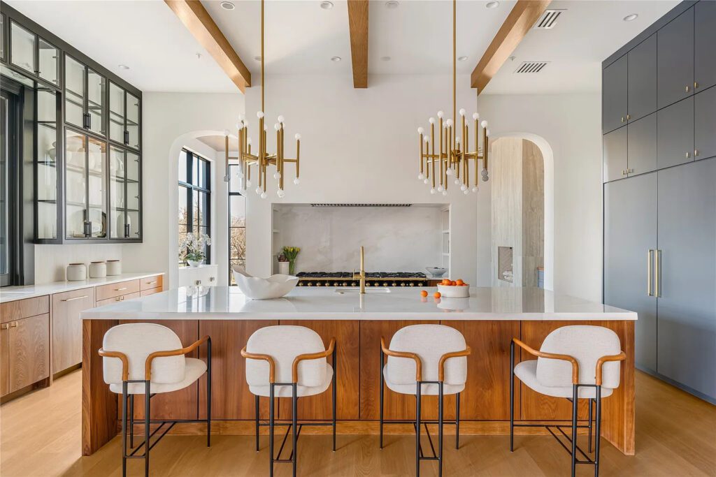 The kitchen features soaring ceilings.  (Photo by Allie Beth Allman & Associates)