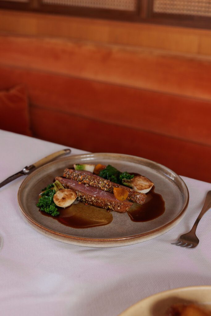 The Hot Honey Crispy Duck Breast is another must-try on Georgie's new menu. (Photo by Mary Margaret Photography)