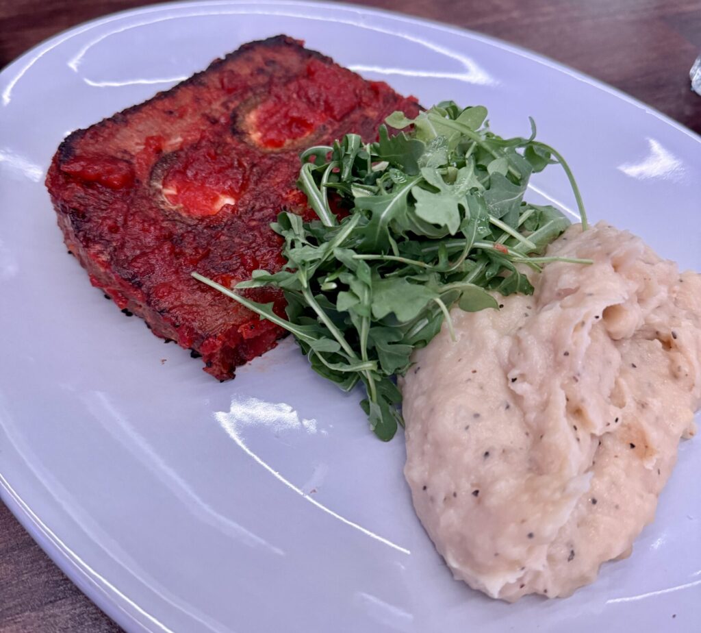 The meatloaf stuffed with a jalapeno popper with mashed potatoes is a favorite on the AM/FM menu. (Photo by Megan Ziots)