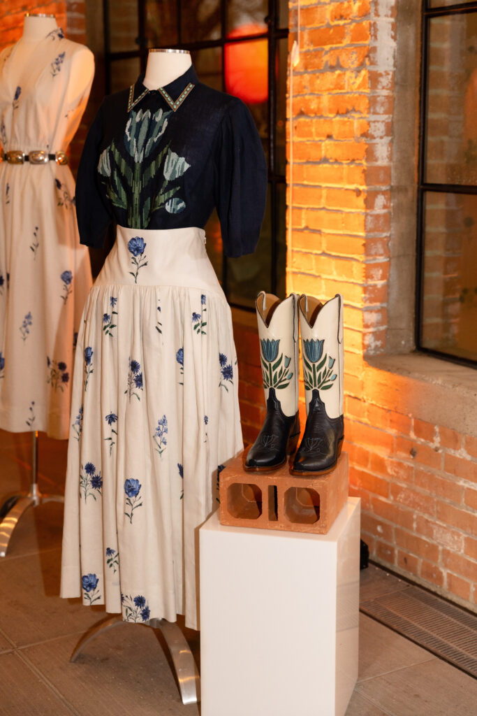 Guests previewed the collection up-close, admiring details on the apparel like intricate floral motifs and elevated leather detailing. (Photo by Kaitlin Saragusa Photography)