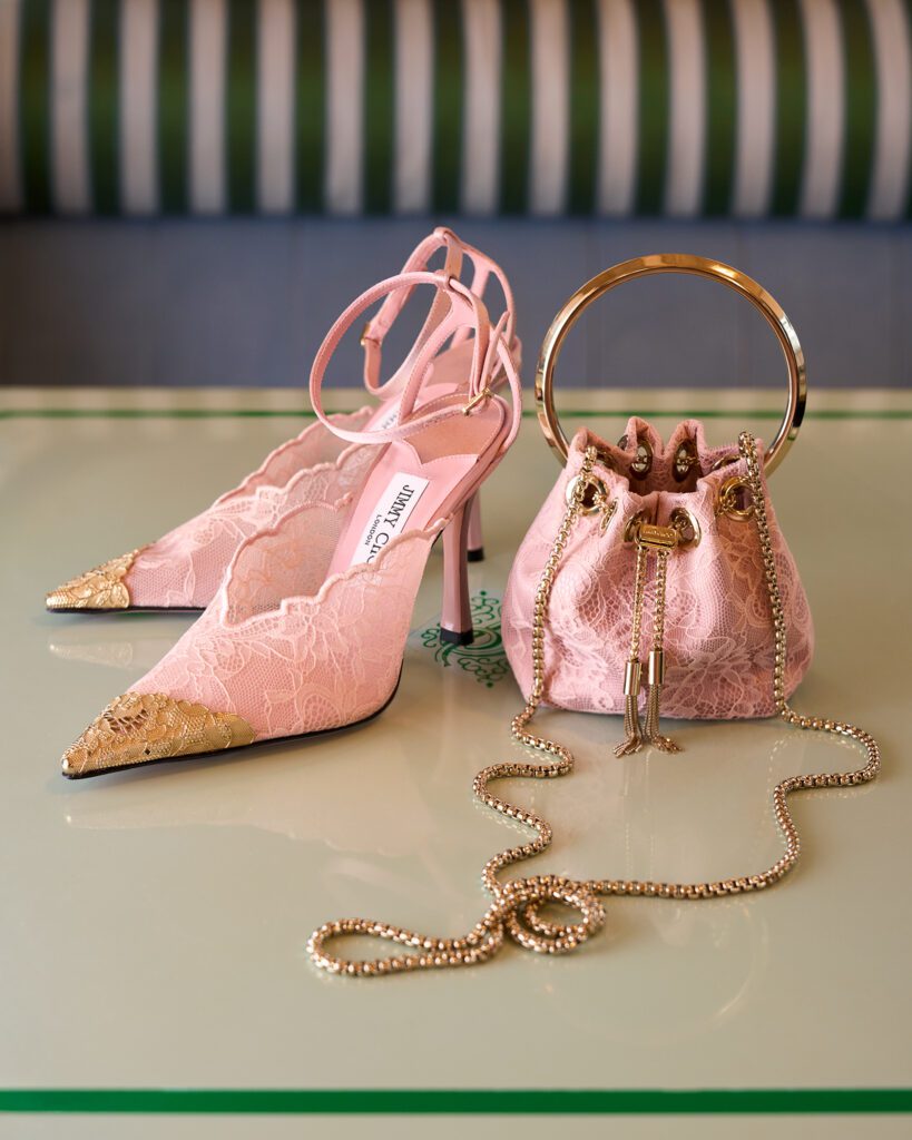 Jimmy Choo brings a look together with pink lace slingback pumps and a matching bucket bag for spring’s most coordinated finish. (Photographed at Sadelle’s)