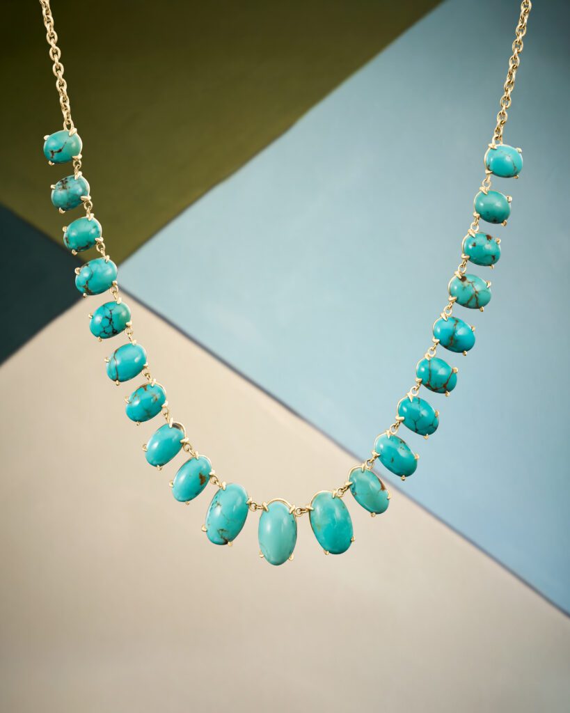 Material Good delivers an oval turquoise cabochon necklace that perfectly highlights the season’s emphasis on bright colors. (Photographed at Material Good)