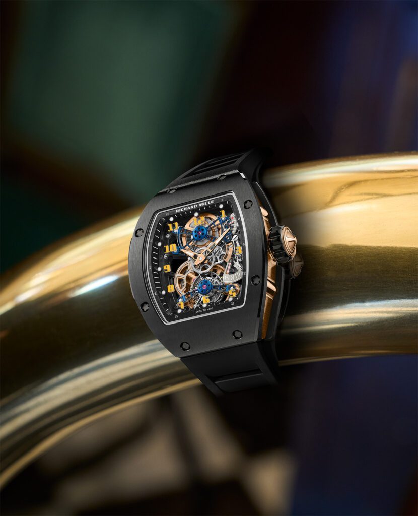 Richard Mille’s black tonneau skeletonized watch is a feat of craftsmanship serving as the perfect timepiece. (Photographed at Café Pacific)