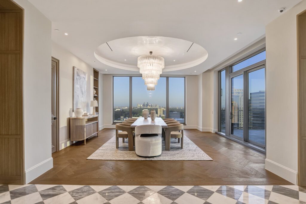 An elegant private dining space framed by sweeping skyline views, perfect for breathtaking views and great for entertaining.