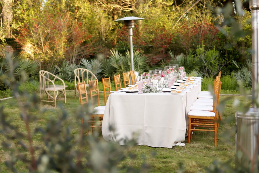 The lush garden sets the stage for the al fresco dinner in River Oaks introducing the Luisa Beccaria trunk show. (Photo by Quy Tran)