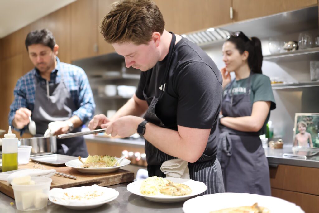 The Adair Kitchen team at work preparing dinner at the Luisa Beccaria trunk show and dinner party. (Photo by Quy Tran)