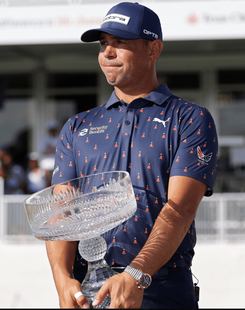 Gary Woodland cradles the Texas Children's Houston Open trophy that shows his strength. (@PGATour)