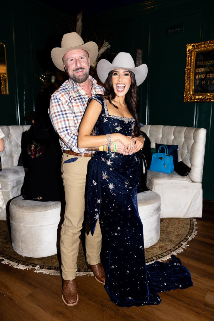 Tony Bradfield, Zinat Ahmed in Cotton Q Club at the World Championship Bar-B-Que Contest. (Photo by Kaitlin Saragusa)