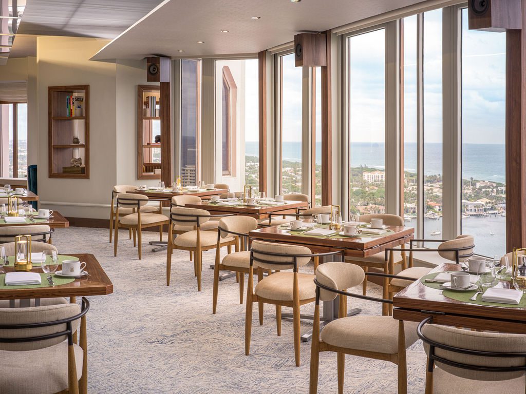 Tower guests have access to the newly reimagined Top of the Tower,  a private lounge on the 27th floor with sweeping views of the Atlantic Ocean and a rotating selection of compelling sips and bites throughout the day. (Photo by The Boca Raton)