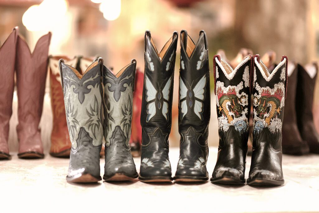 A curated collection of vintage cowboy boots for women are special to the Houston location of Flea Style.