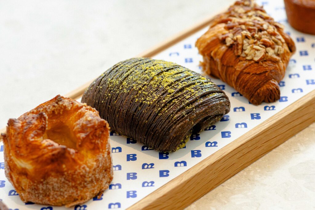 From croissants and Kouign-Amann to cookies, cakes, tarts, and muffins, there’s a ton to try on the pastries menu at The Bread Club. (Courtesy)