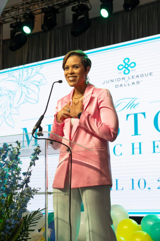 Emcee Laura Harris (Photo by Tamytha Cameron and Celeste Cass)