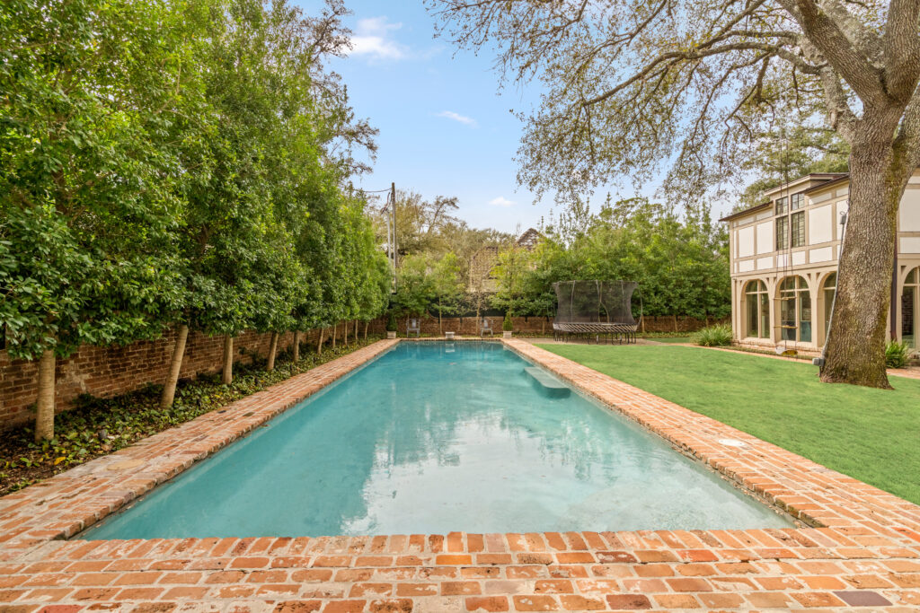 The swimming pool commands attention in the backyard of 1419 Kirby (Photo by Sonya Bertolino / Compass)
