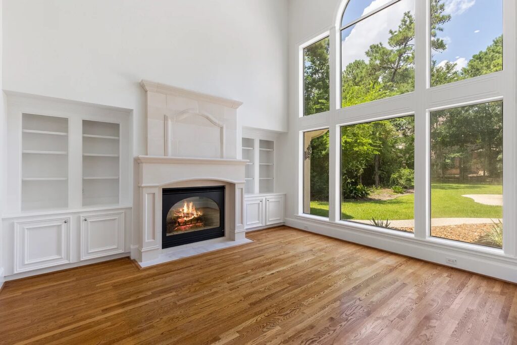 Floor-to-ceiling arched windows are both functional and visually striking.