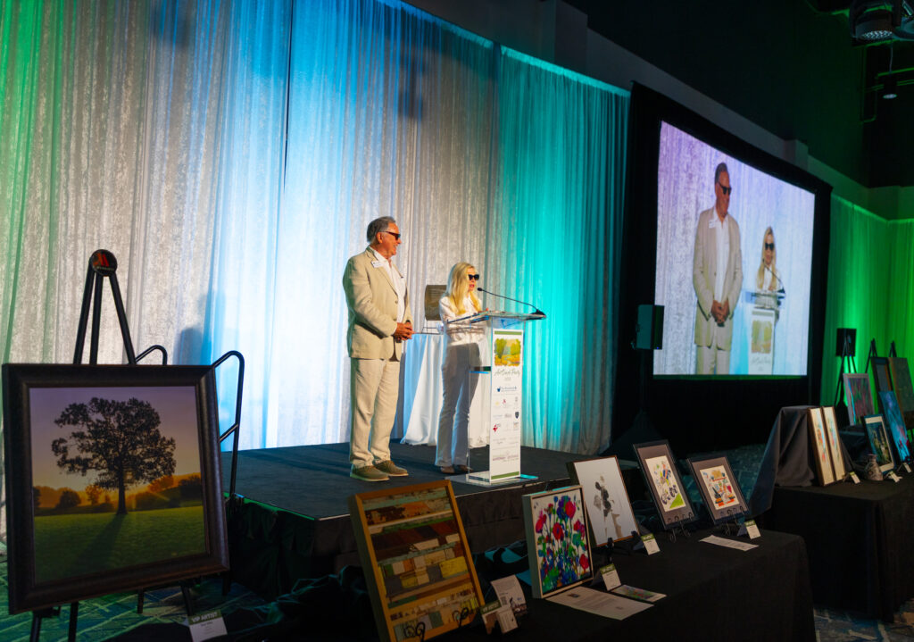 Event co-chairs Bruce Tough and Dr. Ann Snyder at the Art Dash gala during The Woodlands Waterway Arts Festival. (Photo courtesy of Jen Bruse)
