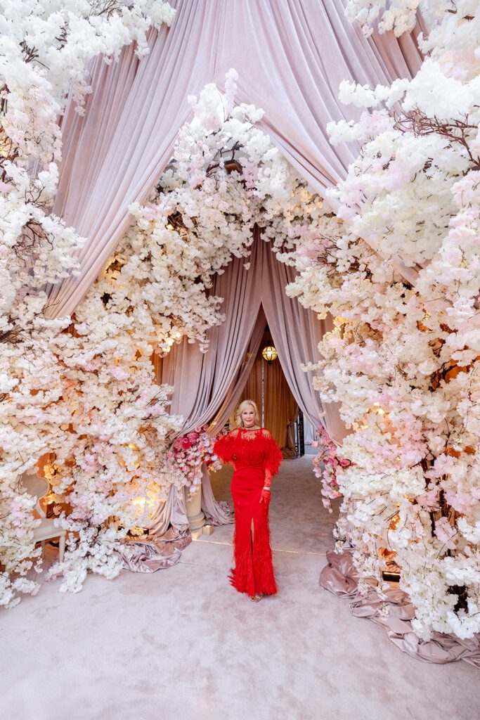 Elizabeth Walraven holds court at her epic 60th birthday bash at Rosewood Mansion on Turtle Creek. (Photo by Anastasiia Photography)